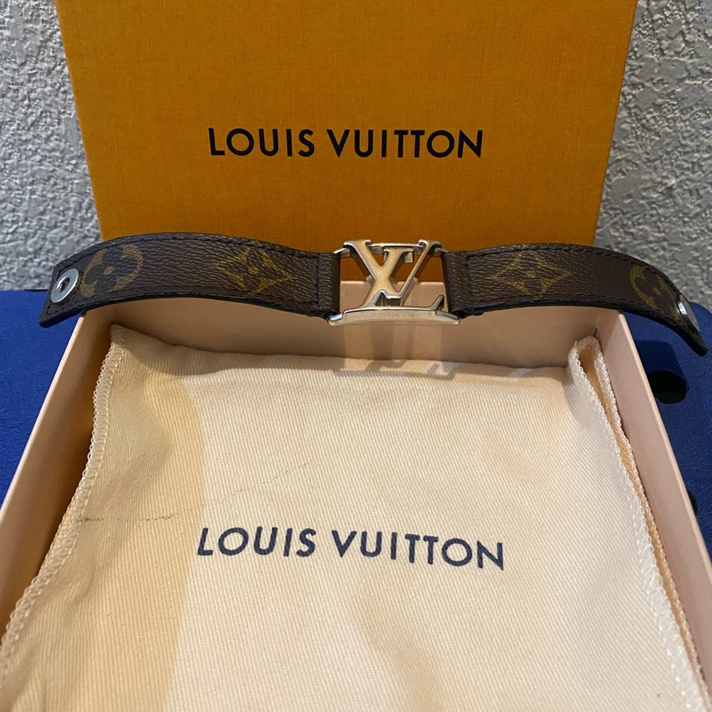 Louis Vuitton Brown Monogram with silver LV logo bracelet. Box, dusty included